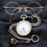 Uhr und Brille